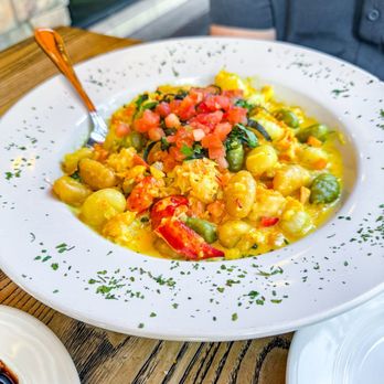 Perche' No signature dishes Gnocchi GorgonzolaLasagna al FornoRavioli di Zucca (Pumpkin Ravioli)Osso Buco